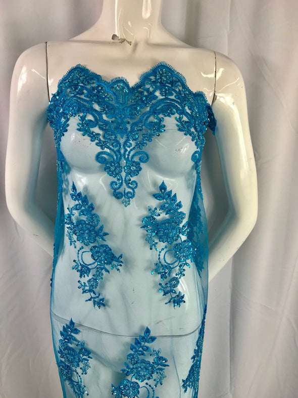 Elegant turquoise hand beaded floral design embroider with sequins on  a mesh lace-dresses-fashion-prom-nightgown-sold by yard.