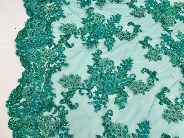 Teal green 3D floral design embroider with sequins and hand beaded with metallic tread on a mesh lace-fashion-dresses-sold by the yard.