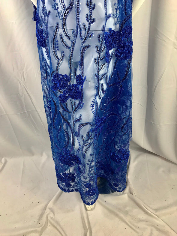 Royal blue tree design with 3d flowers embroider with sequins on a mesh lace. Wedding/ bridal/ nightgowns/ prom dresses. Sold by the yard.