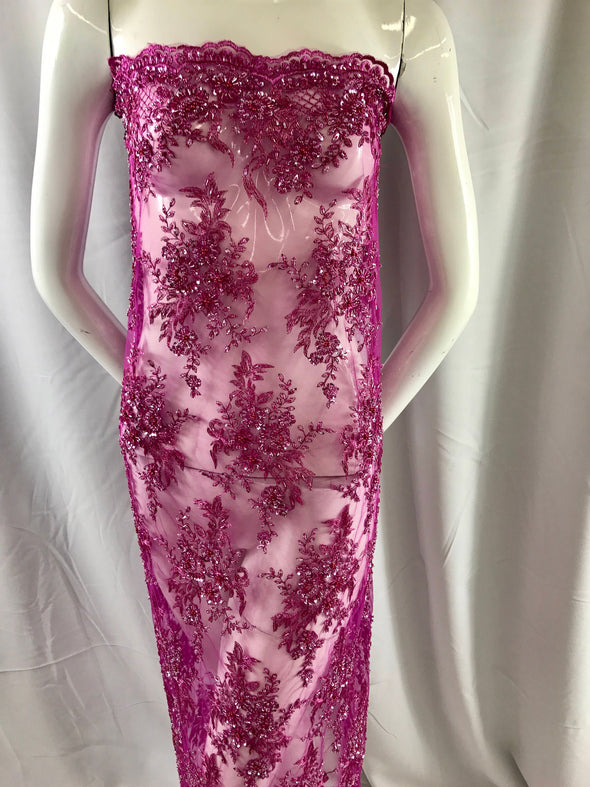 Gorgeous fuchsia/magenta French floral  design embroider and beaded on a mesh lace. Wedding/Bridal/Prom/Nightgown fabric-sold by yard.