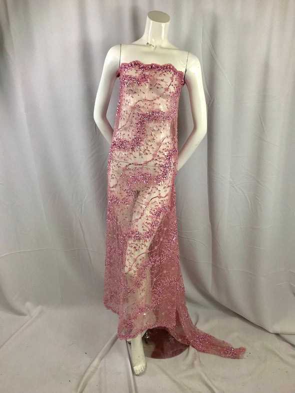 Dusty pink french beaded design embroider on a mesh lace-prom-nightgown-bridal-wedding-dresses-fashion-apparel-decorations-sold by the yard.
