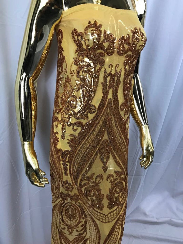 Gold empire design embroider with shiny sequins on a 4 wY stretch power mesh-dresses-fashion-apparel-prom-nightgown-sold by yard.
