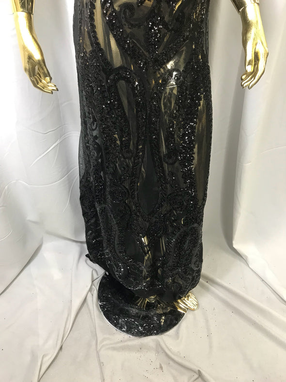 Black diva design embroider with shiny sequins on a 4 way Stretch power mesh-dresses-fashion-apparel-prom-nightgown-sold by the yard.