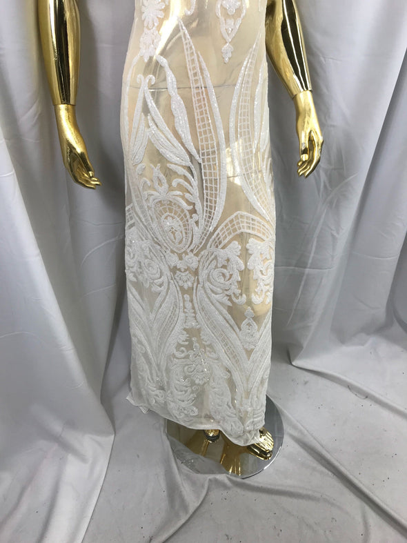 White princess design embroidery with sequins on a 4 way Stretch Mesh-dresses-prom-nightgown-fashion-apparel-sold by the yard.