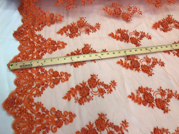 Orange hand beaded floral design embroidery with shiny sequins on a mesh lace-dresses-apparel-fashion-prom-nightgown-sold by the yard.