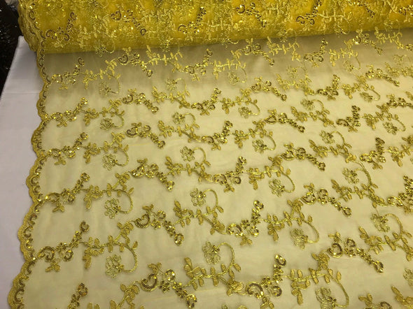 Mustard yellow floral embroidery with shiny sequins and cord on a mesh lace-dresses-fashion-prom-nightgown-apparel-sold by the yard.