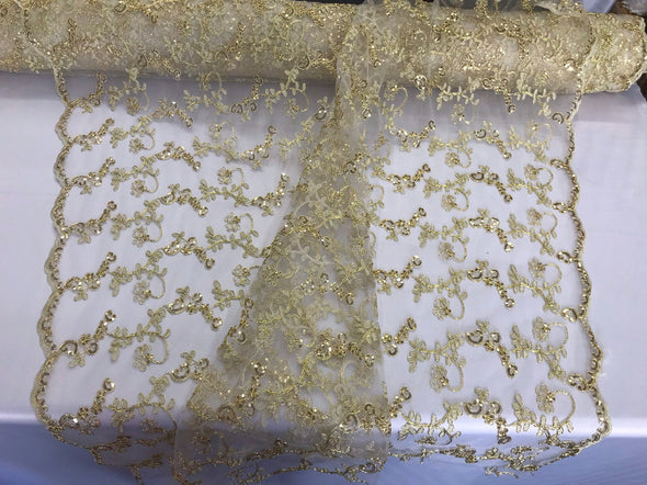 Gold metallic floral embroidery with shiny sequins and cord on a ivory mesh lace-dresses-fashion-prom-nightgown-sold by the yard.