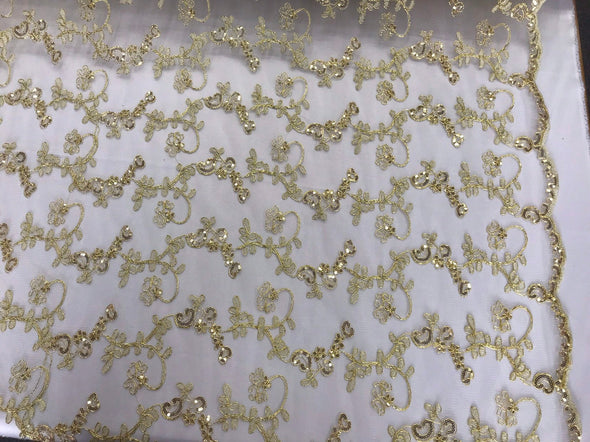 Gold metallic floral embroidery with shiny sequins and cord on a ivory mesh lace-dresses-fashion-prom-nightgown-sold by the yard.