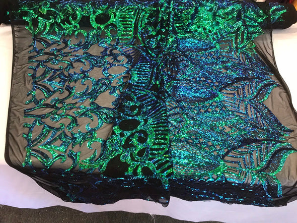 Green royalty iridescent sequins on a 4 way Stretch black mesh lace-dresses-apparel-fashion-prom-nightgown-sold by the yard.