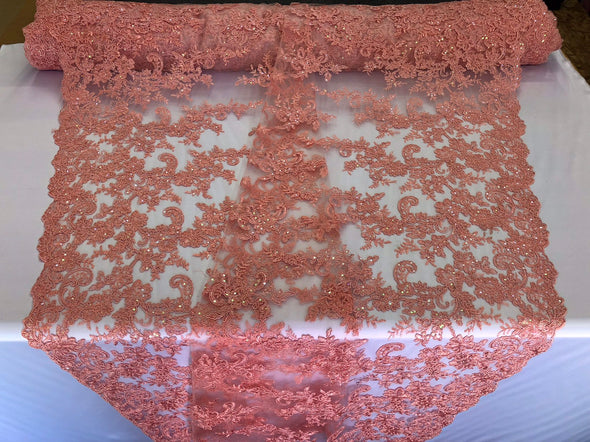 Coral floral design embroidery with shiny iridescent sequins on a medh lace-dresses-fashion-apparel-prom-nightgown-sod by the yard.