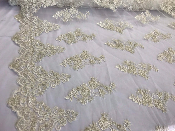 Dark ivory hsnd beaded floral design embroidery with shiny sequins on a mesh lace-dresses-apparel-fashion-prom-nightgown-sold by the yard.