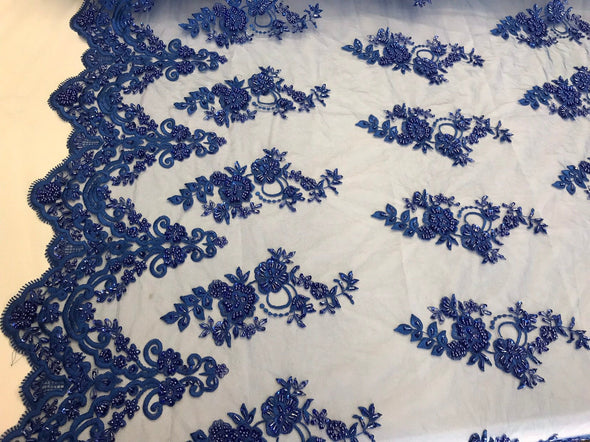 Royal blue hand beaded floral design embroidery with shiny sequins on a mesh lace-dresses-apparel-fashion-prom-nightgown-sold by the yard.