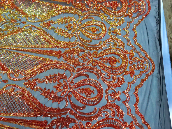 Orange princess design iridescent sequins embroidery on a 4 way stretch black mesh-dresses-fashion-prom-nightgown-apparel-sold by the yard.
