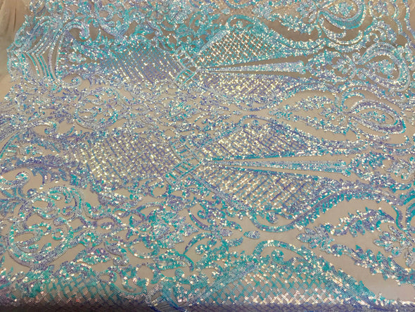 Aqua princess design iridescent sequins embroidery on a 4 way stretch nude mesh-dresses-fashion-apparel-prom-nightgown-sold by the yard.