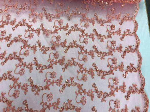 Coral metallic floral embroidery with shiny sequins and cord on a mesh lace-dresses-fashion-prom-nightgown-apparel-sold by the yard.