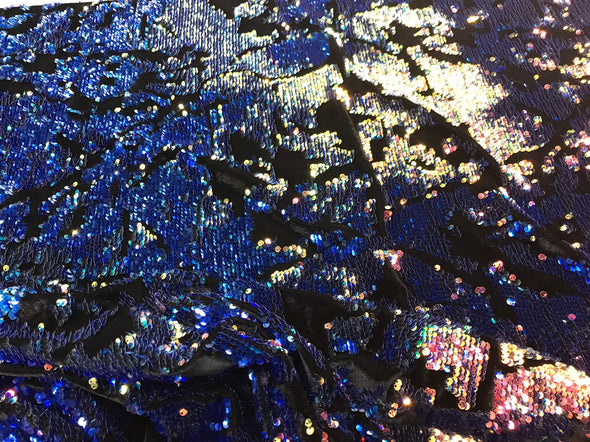 Royal blue iridescent and reversible sequins embroidery on a black 4 way stretch velvet-dresses-fashion-sold by the yard-free shipping USA.