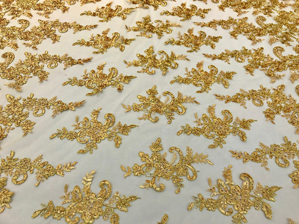 Metallic gold floral design embroidery on a mesh lace with sequins and cord-dresses-fashion-apparel-prom-nightgown-sold by the yard-