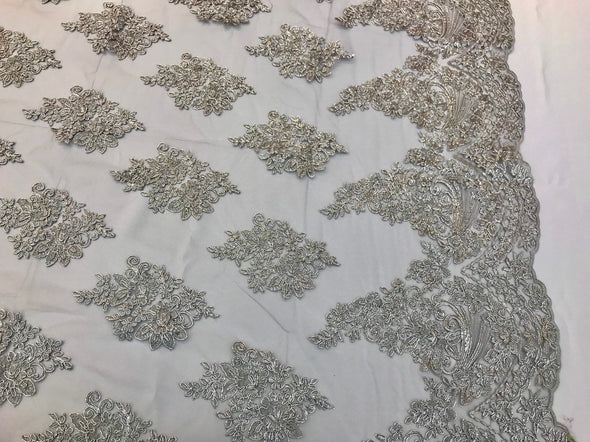 Metallic silver floral de embroidery on a mesh lace with cord-fashion-dresses-prom-nightgown-sold by the yard-free shipping in the usa-