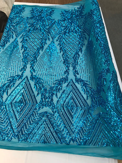 Turquoise geometric diamond design with shiny sequins on a 4 way stretch mesh-dresses-prom-nightgown-sold by the yard-free shipping in USA-