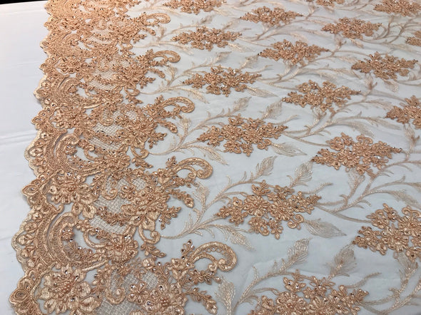 Peach hand beaded vine design embroidery with flowers on a mesh lace-Sold by the yard.