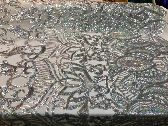 Silver iridescent shiny sequin royalty design embroidery on a 4 way stretch mesh-prom-nightgown-sold by the yard-free shipping in the USA.