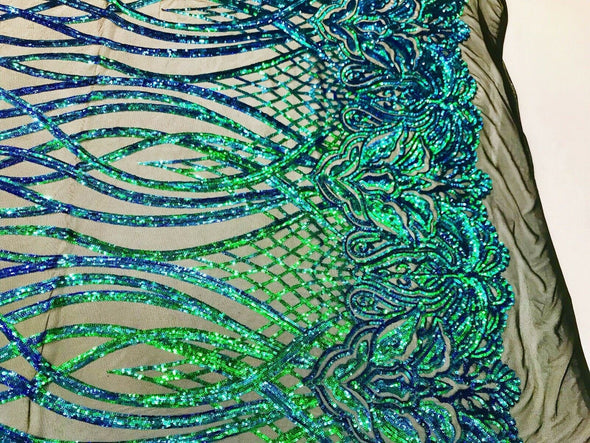 Green iridescent phoenix flames sequin design on a 4 way stretch black mesh-prom-nightgown-sold by the yard-free shipping in the USA-