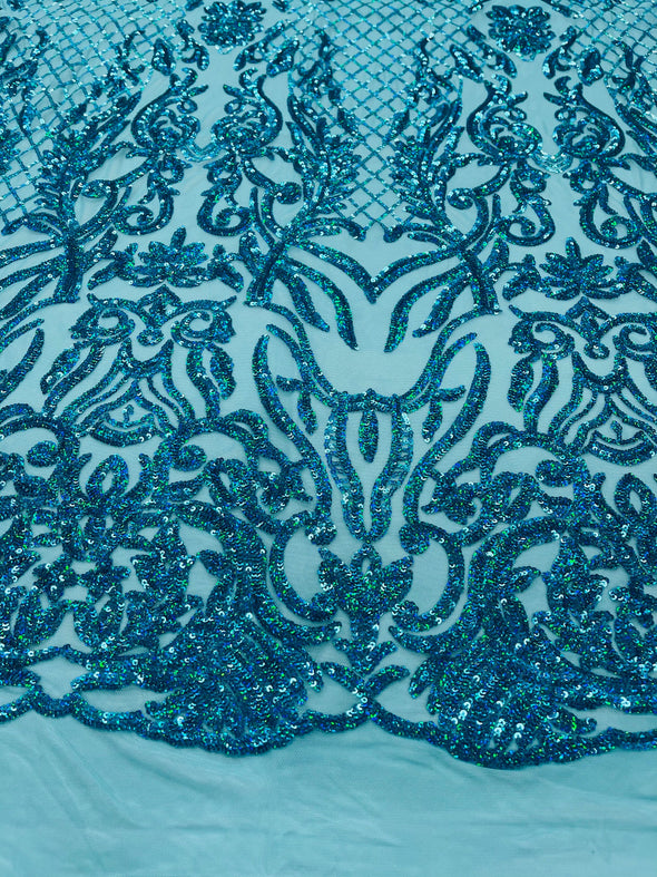 Turquoise iridescent shiny sequin damask design on a 4 way stretch mesh-prom-nightgown-sold by the yard-free shipping in the usa.
