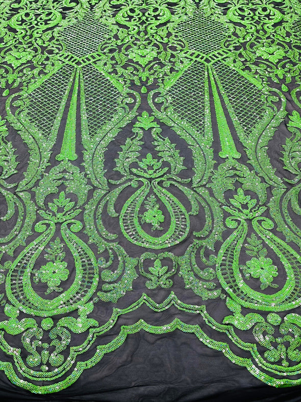 Neon green princess design iridescent sequins embroidery on a 4 way stretch black mesh-dresses-apparel-prom-nightgown-sold by the yard.