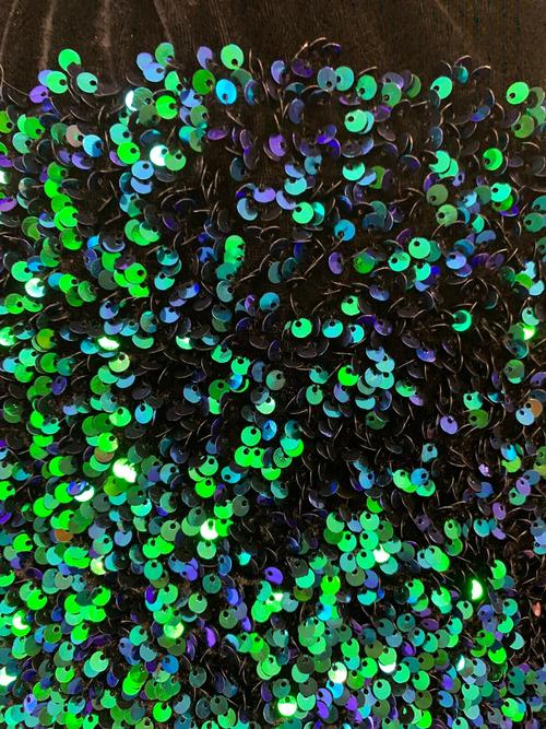 Green Iridescent on Black Stretch velvet with luxury sequins all over 5mm shining sequins 2-way stretch, sold by the yard