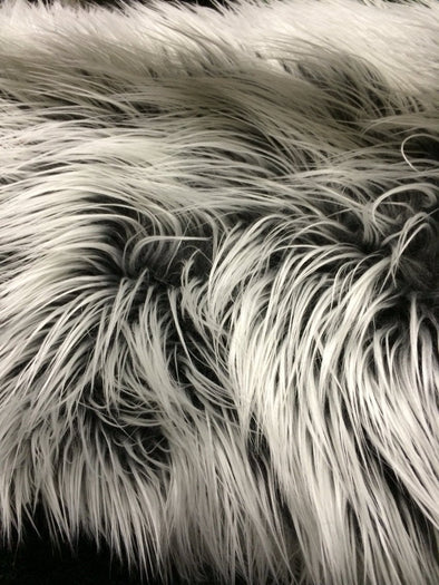 Gray/silver frost Mongolian fake fur.3 inch pile.36x60 inches. Sold by the yard.