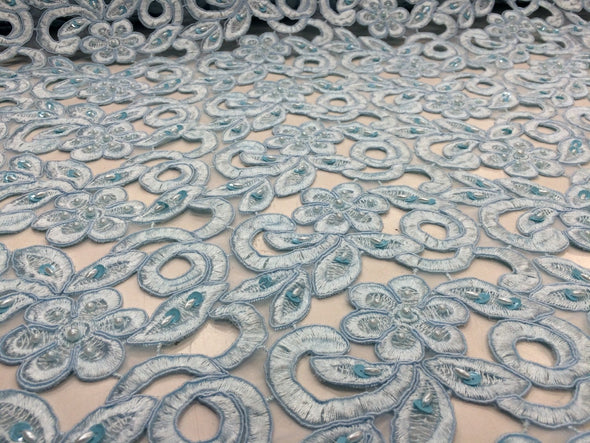 Light blue flowers embroider and habd beaded organza lace.36x50inches. Sold by the yard.