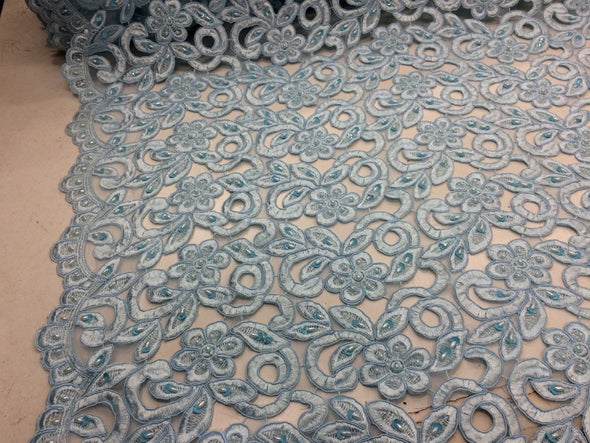 Light blue flowers embroider and habd beaded organza lace.36x50inches. Sold by the yard.