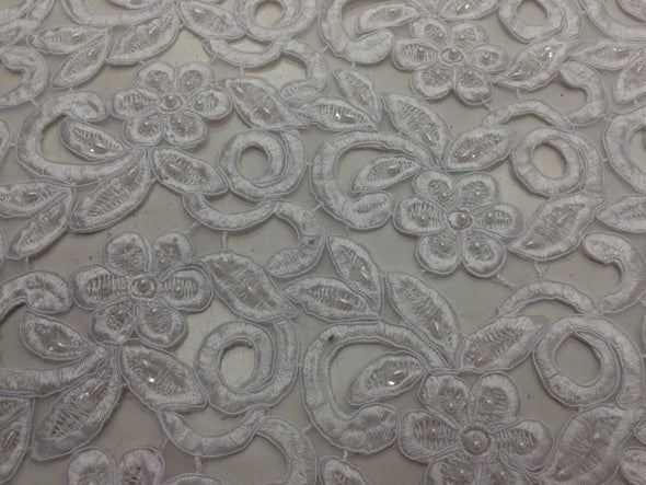 White flowers embroider and hand beaded organza lace.36x50inches. Sold by the yard.