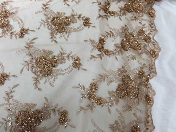 Nude/ metallic gold flowers french design embroider and hand beaded on a mesh lace.36x50inches. Wedding-Bridal fabric lace. Sold by the yard