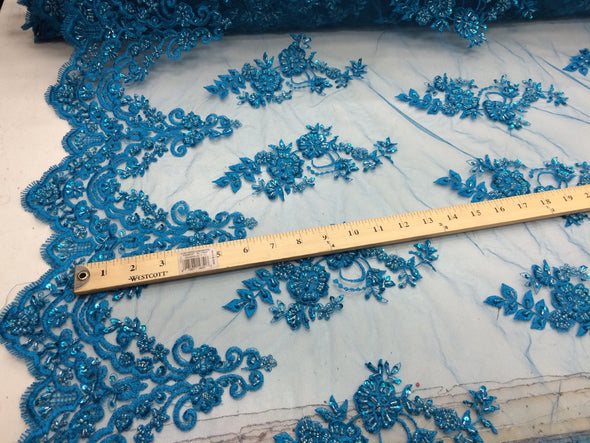 Elegant turquoise hand beaded floral design embroider with sequins on  a mesh lace-dresses-fashion-prom-nightgown-sold by yard.