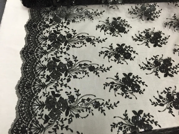 Black flowers embroider with sequins on a mesh lace. Wedding/Bridal/Nightgown/prom fabrics.
