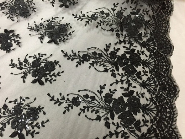 Black flowers embroider with sequins on a mesh lace. Wedding/Bridal/Nightgown/prom fabrics.