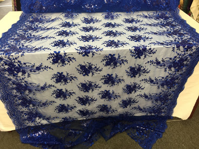 Royal blue flowers embroider with sequins on a mesh lace. Wedding/Bridal/Prom/Nightgown fabrics.