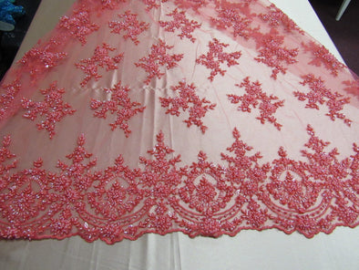 Luxurious coral French design embroider and beaded on a mesh lace. Wedding/Bridal/Prom/Nightgown fabric.