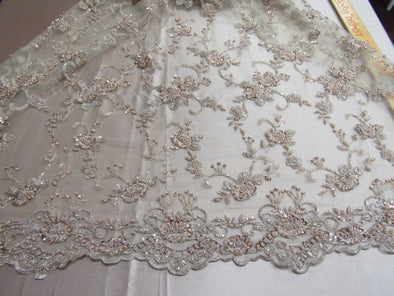 Elegant skin color French design embroider and beaded on a mesh lace. Wedding/Bridal/Prom/Nightgown fabric.