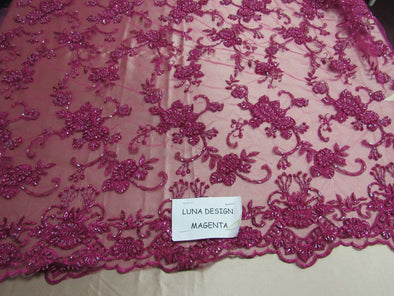 Elegant magenta French design embroider and beaded on a mesh lace. Wedding/Bridal/Prom/Nightgown fabric.