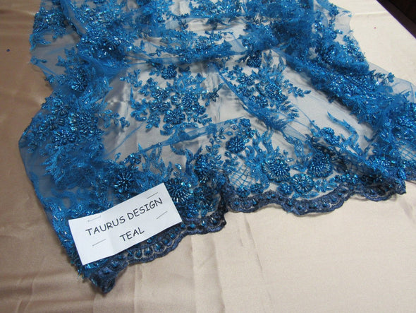 Gorgeous teal blue French design embroider and beaded on a mesh lace. Wedding/Bridal/Prom/Nightgown fabric.