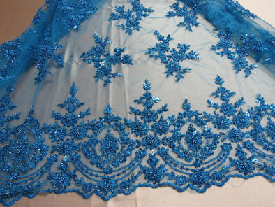 Luxurious Turquoise French design embroider and beaded on a mesh lace. Wedding/Bridal/Prom/Nightgown fabric.