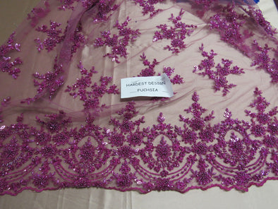 Luxurious fuchsia/ magenta French design embroider and beaded on a mesh lace. Wedding/Bridal/Prom/Nightgown fabric.