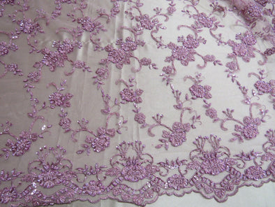 Elegant pink French design embroider and beaded on a mesh lace. Wedding/Bridal/Prom/Nightgown fabric.