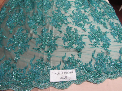 Gorgeous jade French design embroider and beaded on a mesh lace. Wedding/Bridal/Prom/Nightgown fabric .
