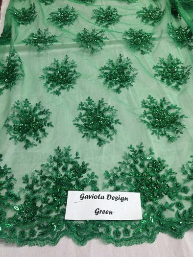 Green gaviota design embroider and beaded on a mesh lace. Wedding/Bridal/Prom/Nightgown fabric. Sold by the yard.