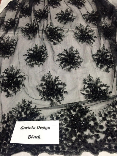 Black gaviota design embroider and beaded on a mesh lace. Wedding/Bridal/prom/Nightgown fabric. Sold by the yard.