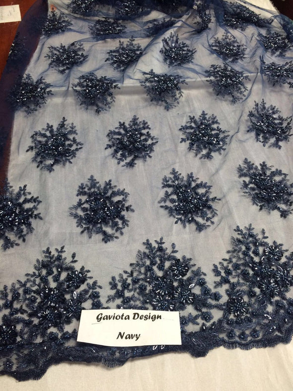Navy blue gaviota design embroider and beaded on a mesh lace. Wedding/Bridal/Nightgown/Prom fabric. Sold by the yard.