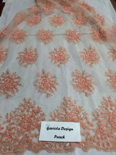 Peach gaviota design embroider and beaded on a mesh lace. Wedding/Bridal/Nightgown/Prom fabric. Sold by the yard.